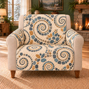 Spiral Pebble Mosaic sofa cover on a beige armchair