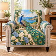 Peacock in hydrangea garden quilted sofa cover on an armchair, AI-generated product mockup