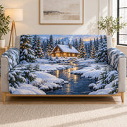 Snowy cabin and forest stream quilted sofa cover on a couch, AI-generated product mockup