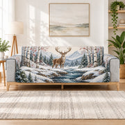 Winter deer by snowy mountain stream quilted sofa cover on a couch, AI-generated product mockup