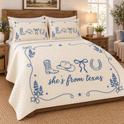 Left angle of fully unfolded Texas cowgirl quilt with upper border and diamond stitching
