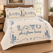 Right angle of fully unfolded Texas cowgirl quilt with upper border and diamond stitching