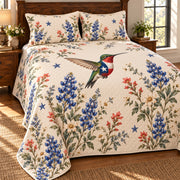 Texas flag hummingbird and airy bluebonnet quilt left angle