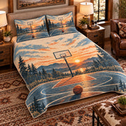 Elevated left-angle view AI mockup of the Empty Court Sunrise basketball quilt set with two coordinating printed pillow shams.
