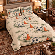 Elevated left-angle view AI mockup of the Soccer Training Cones soccer quilt set with two coordinating printed pillow shams.
