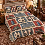 Elevated left-angle view AI mockup of the Soccer Equipment Cubes soccer quilt set with two coordinating printed pillow shams.