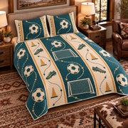 Elevated left-angle view AI mockup of the Soccer Strategy Ribbon soccer quilt set with two coordinating printed pillow shams.