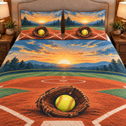 Frontal close-up view AI mockup of the Softball Diamond Sunrise fastpitch softball quilt set with two coordinating printed pillow shams.