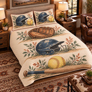 Elevated left-angle view AI mockup of the Dugout Equipment Studies fastpitch softball quilt set with two coordinating printed pillow shams.