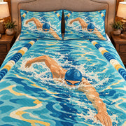 Frontal close-up view AI mockup of the Freestyle Ripple Study competitive swimming quilt set with two coordinating printed pillow shams.