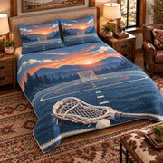 Elevated left-angle view AI mockup of the Lacrosse Field Dawn field lacrosse quilt set with two coordinating printed pillow shams.