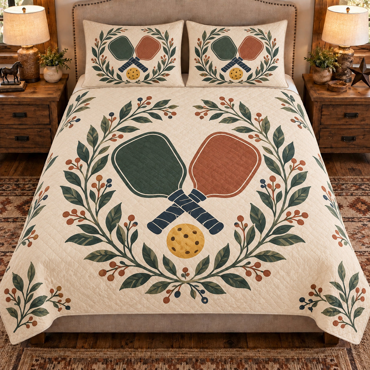 Front view AI mockup of the Pickleball Paddle Botanical pickleball quilt set with two coordinating printed pillow shams.