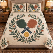 Front view AI mockup of the Pickleball Paddle Botanical pickleball quilt set with two coordinating printed pillow shams.
