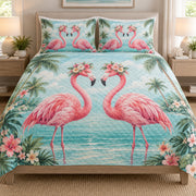 Romantic Flamingo Tropical Love quilt set displayed on a bed with coordinating pillow shams