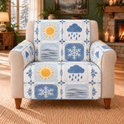 Weather Symbol Tiles sofa cover on a beige armchair